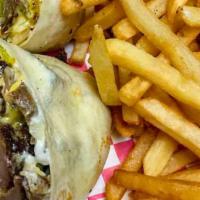 Gyro Philly Wrap · 100% lamb gyro meat, banana peppers, and onions with American cheese, mayo in a wrap and fri...