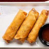 Crispy Spring Rolls · Vermicelli rice noodles, shrimp and vegetable egg roll served with sweet chili sauce