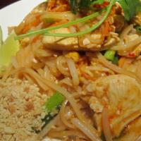 Pad Thai · Rice noodles stir-fried with egg, onion,bean sprout,carrots,red bell pepper served with crus...