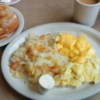 The Simple Classic Breakfast · Two eggs any style, homemade hashbrowns, toast, and jelly.