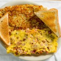 Hungry Man Omelette · Three egg omelette with ham, sausage, bacon, and american cheese. Served with homemade hashb...