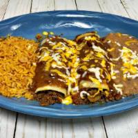 Enchilada Lunch · Two enchiladas with cheese, beef or chicken with your preferred sauce, and cheese. Served wi...