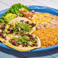Mexican Tacos · Three soft corn tortilla tacos filled with beef, chicken or pastor fajita with onions, cilan...