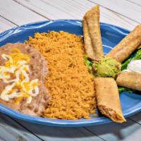 Flauta Lunch · Chicken or beef flautas with guacamole and sour cream. Served with two sides.