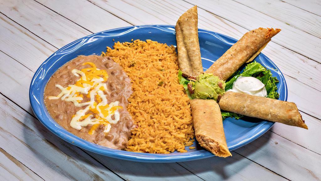 Flauta Lunch · Chicken or beef flautas with guacamole and sour cream. Served with two sides.