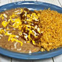 Combo Plate (One Choice) · Create your own combination served with two sides. Made with fajita meat for an additional c...