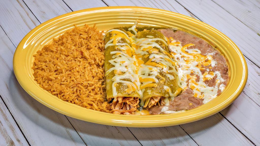 Enchiladas Verdes · Two chicken, beef or cheese enchiladas with green sauce and cheese on top. Served with two sides.