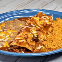 Burrito Rojo · Tender cuts of beef or chicken fajita cooked in red sauce with two sides.