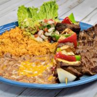 Norteño · Perfect combination of tenderized carne asada and our traditional brocheta. Served with guac...