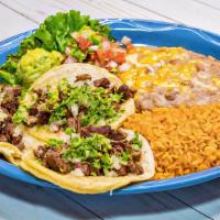 Mexican Tacos · Three soft corn tortilla tacos filled with beef, chicken or pastor fajita with onions, cilan...