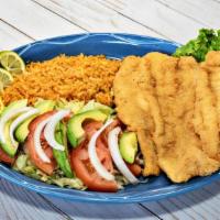 Pescado Dorado · Grilled fish fillet. Served with rice and salad.