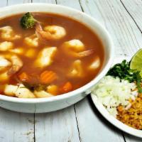 Caldo De Pescado · Fish soup.