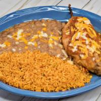 Chile Relleno · Chile relleno (beef, chicken or cheese) with ranchera sauce and cheese on top. Served with t...