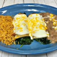 Spinach Enchiladas · Vegetariano. Two spinach enchiladas with your preferred sauce and cheese on top. Served with...