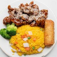 Sesame Chicken · Served with chicken fried rice.