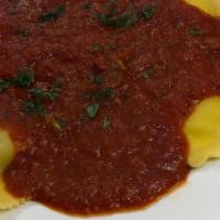 Ravioli · Meat or cheese ravioli topped with our fresh sauce.