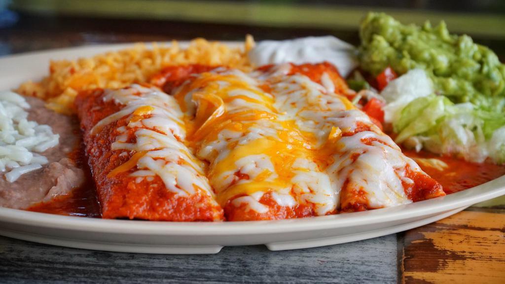Enchilada Dinner · Popular item. Choose two: chicken with sour cream sauce, beef with chili con carne or cheese and onion with chili con carne.