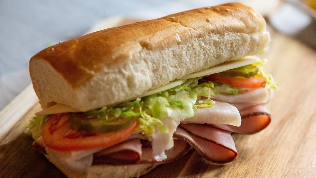 Turkey & Ham · Deli turkey and ham with your choice of cheese .