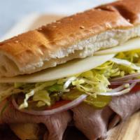 Roast Beef · Thinly sliced roast beef seasoned and cooked on premises. With your choice of cheese.