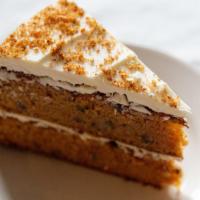 Carrot Cake · Decadent carrot cake topped with cream cheese frosting.