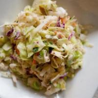 Small Jalapeño Cilantro Coleslaw · Not too spicy! A creamy coleslaw with a hint of jalapeño and cilantro.  A fresh twist on a c...