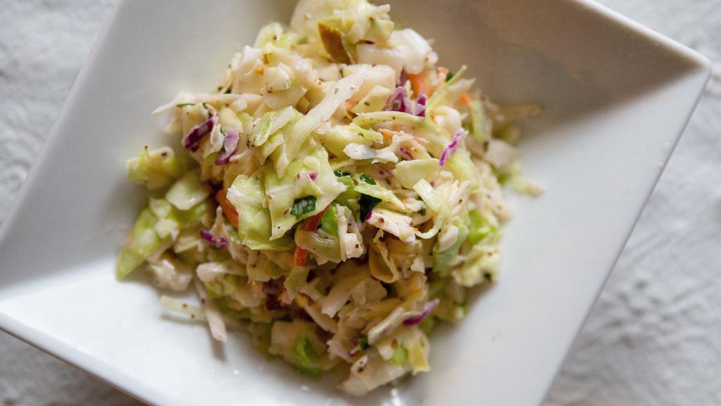 Small Jalapeño Cilantro Coleslaw · Not too spicy! A creamy coleslaw with a hint of jalapeño and cilantro.  A fresh twist on a classic.
