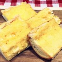 Garlic Bread · House-baked bread with garlic butter