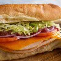 Autumn Turkey · Premium roasted turkey, melted cheddar, cranberry-Dijon sauce, lettuce, tomato and onion. Se...