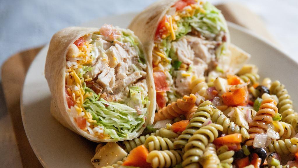 Chicken Bacon Ranch Wrap · Grilled chicken with bacon, cheddar jack, lettuce, tomato, onion, and ranch.