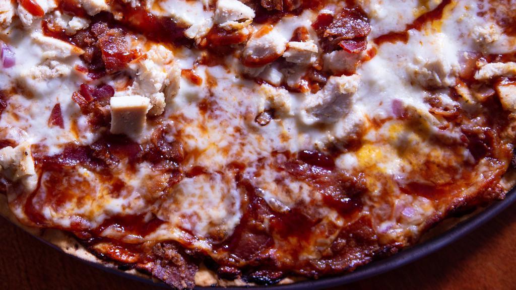 Bbq Chicken Pizza · BBQ sauce, chicken breast, onion and bacon.