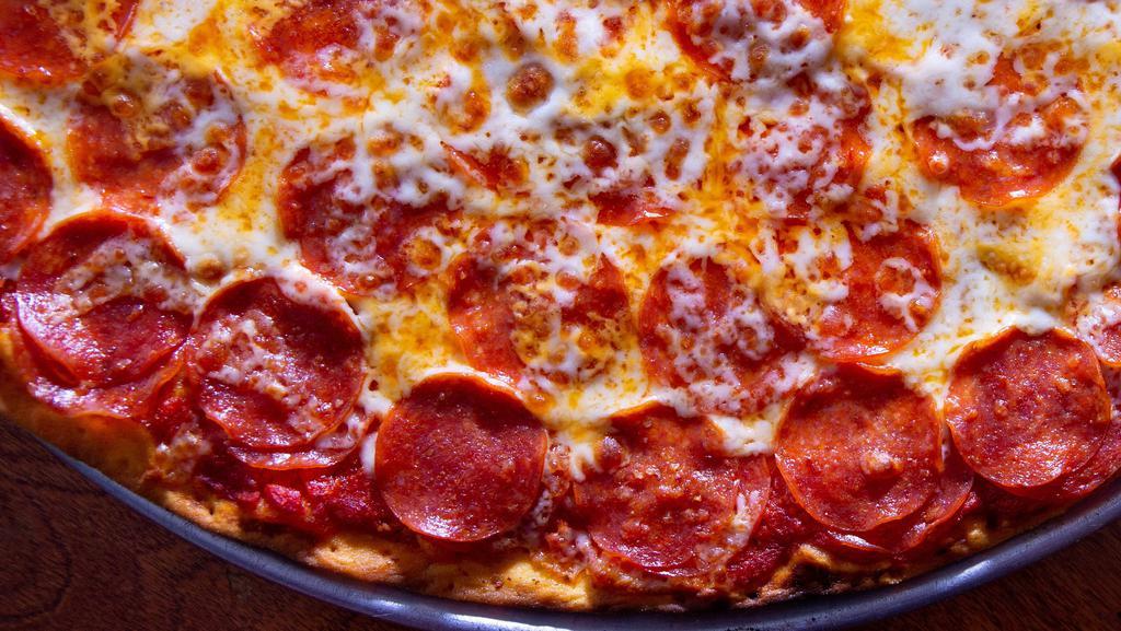 Double Pepperoni & Extra Cheese · A layer of pepperoni, a layer of cheese, another layer of pepperoni and extra cheese.