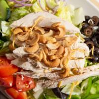 Chicken Cashew Salad · Grilled chicken breast, cashews, cheddar jack, tomato, black olive, green pepper, cucumber, ...