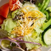 Mini Garden Salad · Cheddar jack, tomato, black olive, green pepper, cucumber, onion and mushroom.