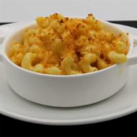 Kids' Macaroni & Cheese · Classic macaroni and cheese served with a piece of buttered bread