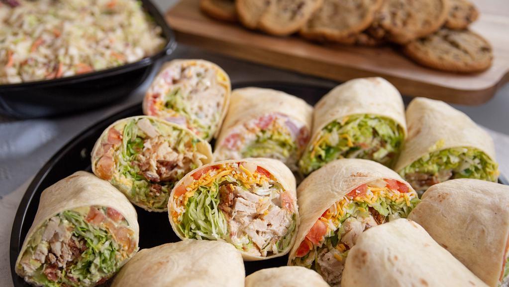 Wrap Tray Plus+ (12 Servings) · Includes our standard Wrap Tray, plus+ a deli side & chocolate chip cookies for twelve.