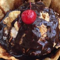 Fried Ice Cream · A scoop of ice cream fried in special covering and place into flour tortilla bowl. Served in...