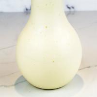 Pina Colada · Vanilla Gelato with coconut and Pineapple served in our signature light bulb cup