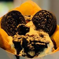 Cookies & Cream Bubble Waffle · Cookies & cream gelato, oreos, whipped cream and chocolate sauce served in a bubble waffle.