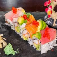 Rainbow Roll · California roll topped with tuna, salmon and white fish, avocado eight pcs per order.
