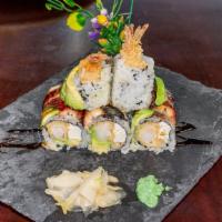 Dancing Eel Roll · Shrimp tempura, avocado, cream cheese topped with eel, avocado and eel sauce.
