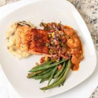 Salmon New Orleans (With Jumbo Shrimp) · New Orleans blackened topped with jumbo shrimp in a spicy cream sauce and homemade Pico de G...