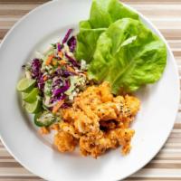 Bang Bang Shrimp (Delivery) · Fried shrimp tossed in sweet chili aioli, served with fresno chili, bibb lettuce, cabbage sa...
