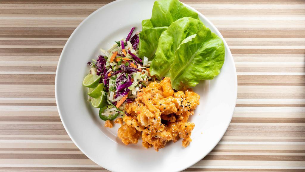 Bang Bang Shrimp (Delivery) · Fried shrimp tossed in sweet chili aioli, served with fresno chili, bibb lettuce, cabbage salad and fresh lime