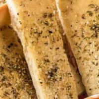 Garlic Breadsticks · Brushed with garlic butter, topped with mozzarella cheese and sprinkled with Parmesan. Choic...
