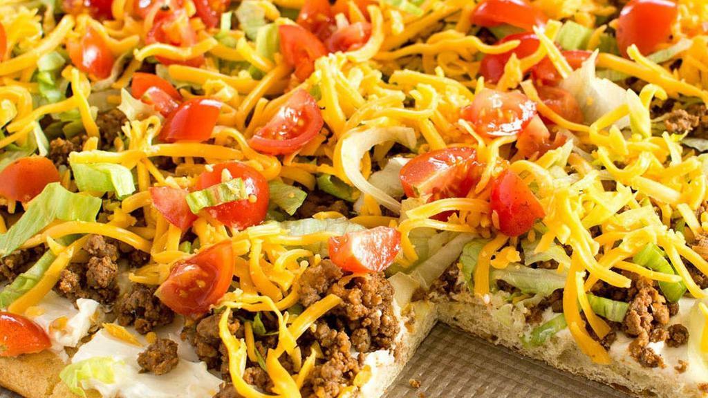 Taco Pizza · You'll say ole to our classic taco pizza - taco meat, cheddar and mozzarella cheeses, lettuce and diced tomatoes. Choice of medium, large or giant.