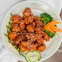 General Tso'S Chicken · Hot and Spicy.  combination meal  come with fried rice  and 3 piece  fried cream chess woton