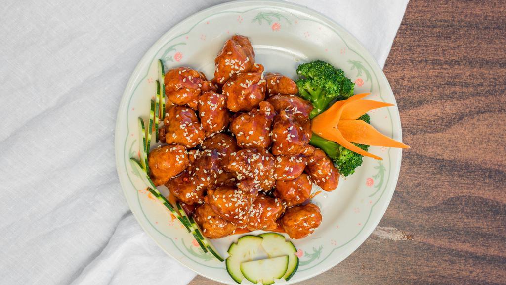 General Tso'S Chicken · Hot and Spicy.  combination meal  come with fried rice  and 3 piece  fried cream chess woton