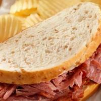 Corned Beef With Potato Chips · With sauerkraut and cheese or your choice
