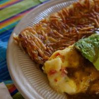 Enchiladas Suizas · Three enchiladas filled with choice of ground beef, shredded chicken, pastor, steak, or shre...