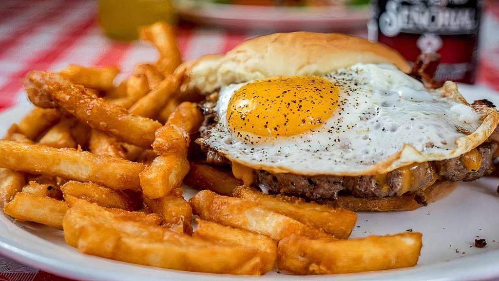Milwaukee'S Best Burger · Cheddar cheese, bacon, topped with egg sunny side up.